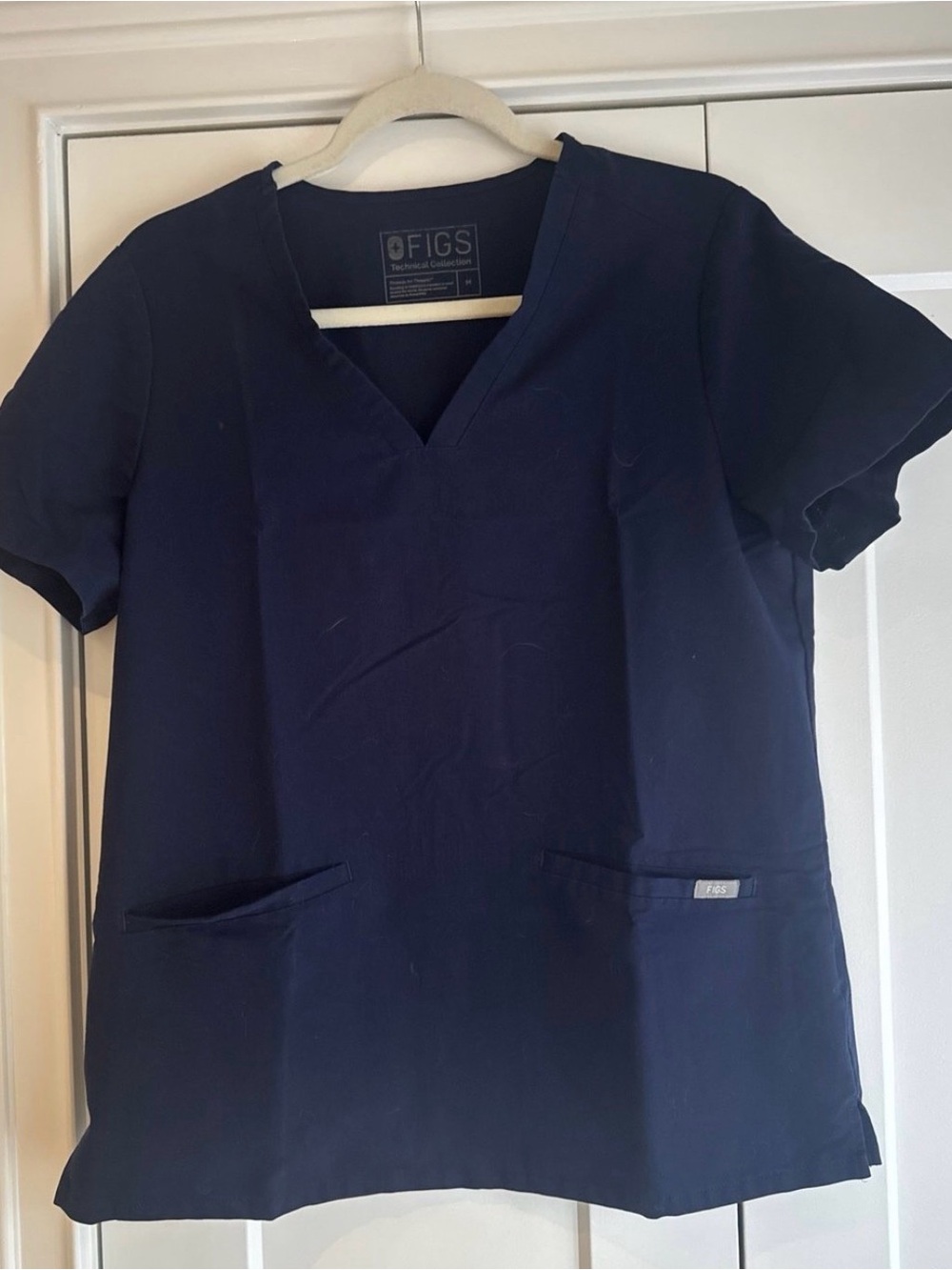 Figs Women's Navy V-Neck Scrub Top with Front Pockets
